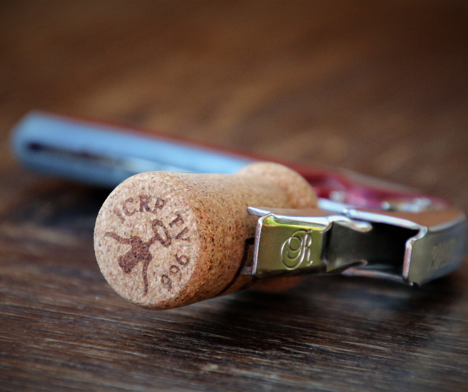 Where should we put the cork after opening the bottle of wine?