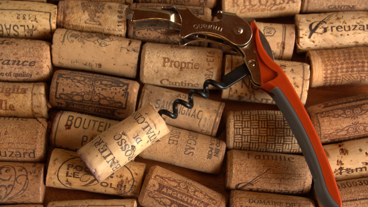 Where should we put the cork after opening the bottle of wine?